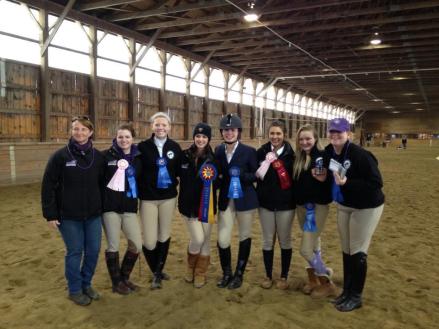 The victorious Curry Equestrian team. From left to right: Coach Betsy Kupic, Emma Ripatrazone, Kelsey O'brien, Alyssa Konstantino, Chelsea Cotton, Courtney Tourcotte, Jamie DeBenedictis, Katelyn O'toole. Not pictured: Katy Longchamp, Kat Doering, Samantha Weintraub.