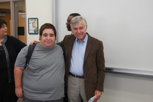 The author with former Massachusetts Gov. Michael Dukakis. // Courtesy Photo